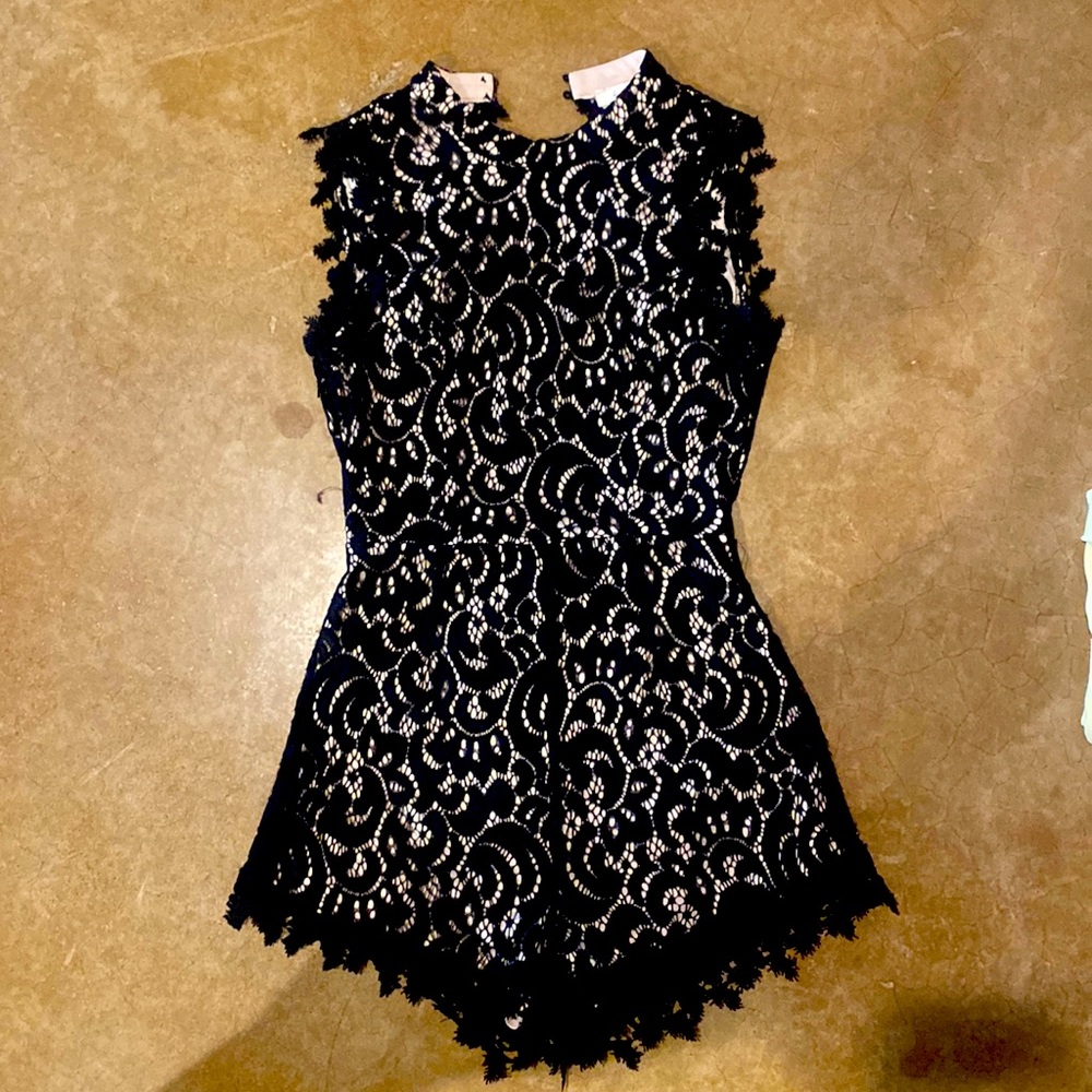 Black lace romper with an open back!